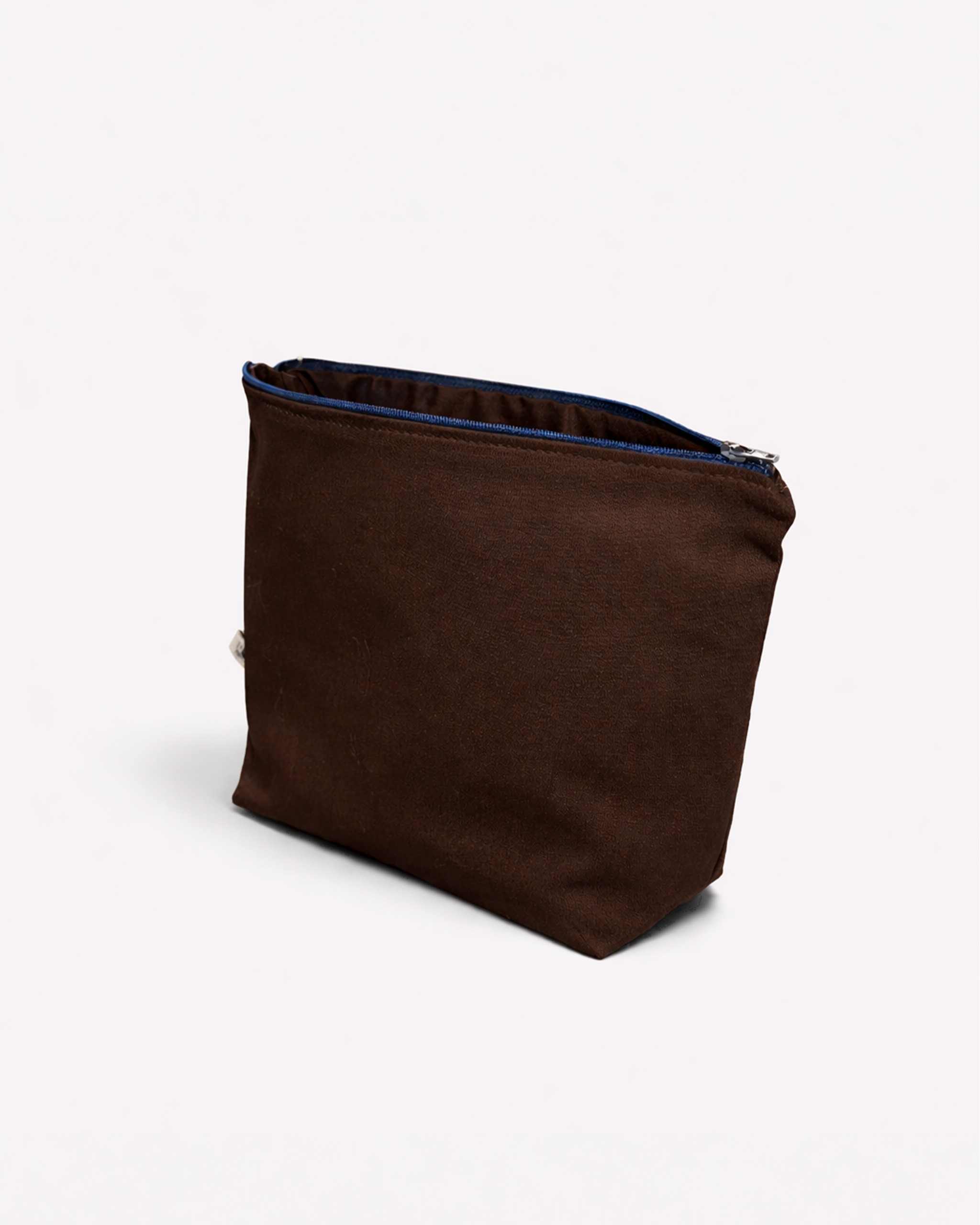 Chocolate brown toiletry bag with open blue zipper side view