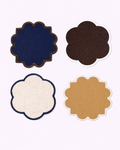Four cotton coasters in navy blue, chocolate brown, off-white, and camel front view