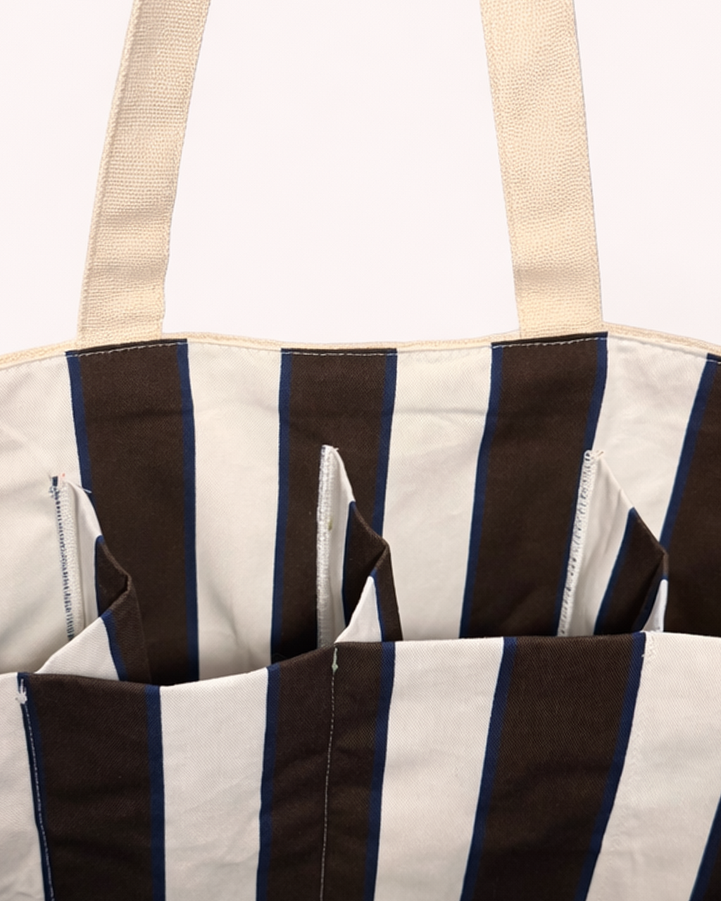 Cotton tote bag with striped interior compartments front view