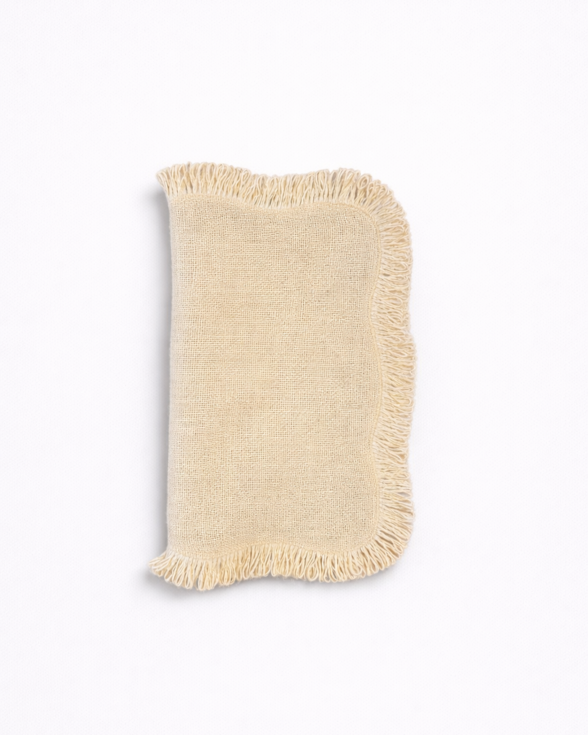 Folded light jute placemat with fringed edges front view
