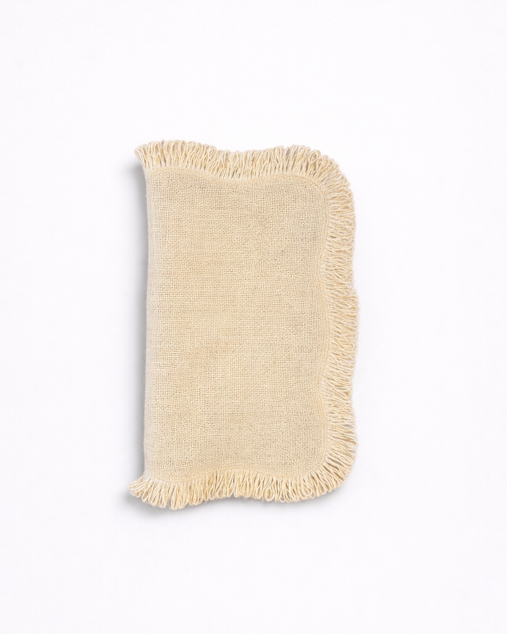 Folded light jute placemat with fringed edges front view