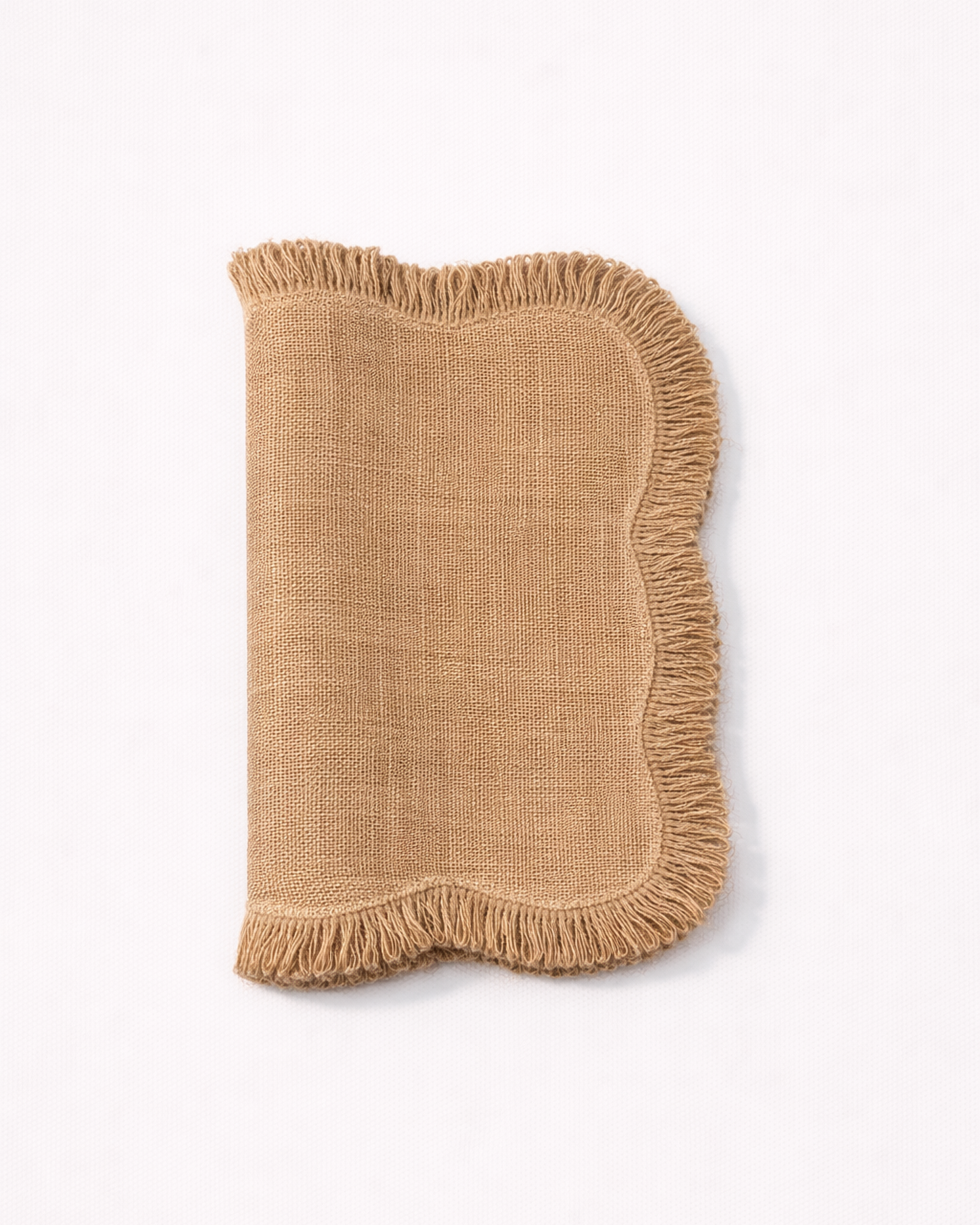 Folded natural jute placemat with fringed edges front view