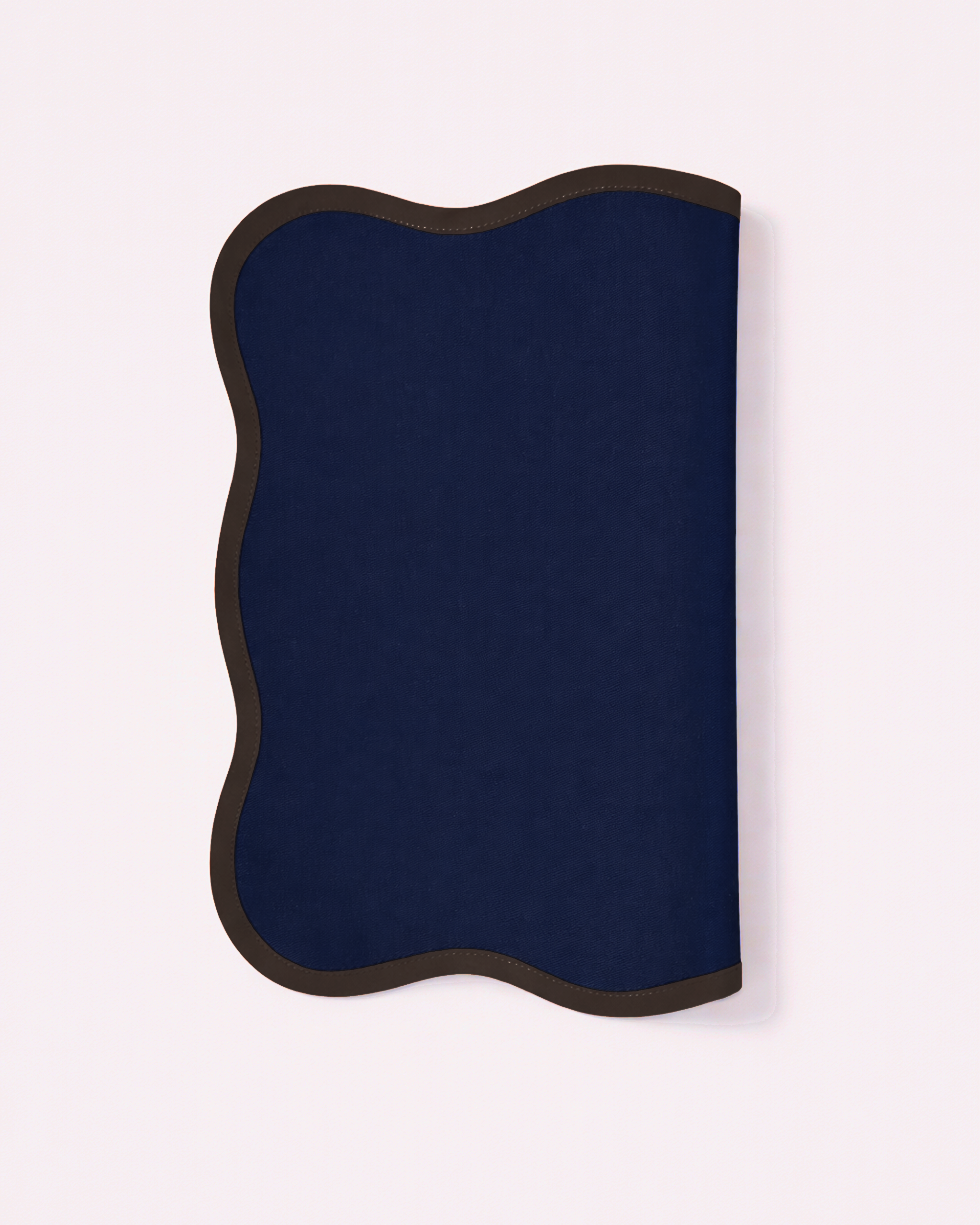 Folded navy blue cotton placemat front view