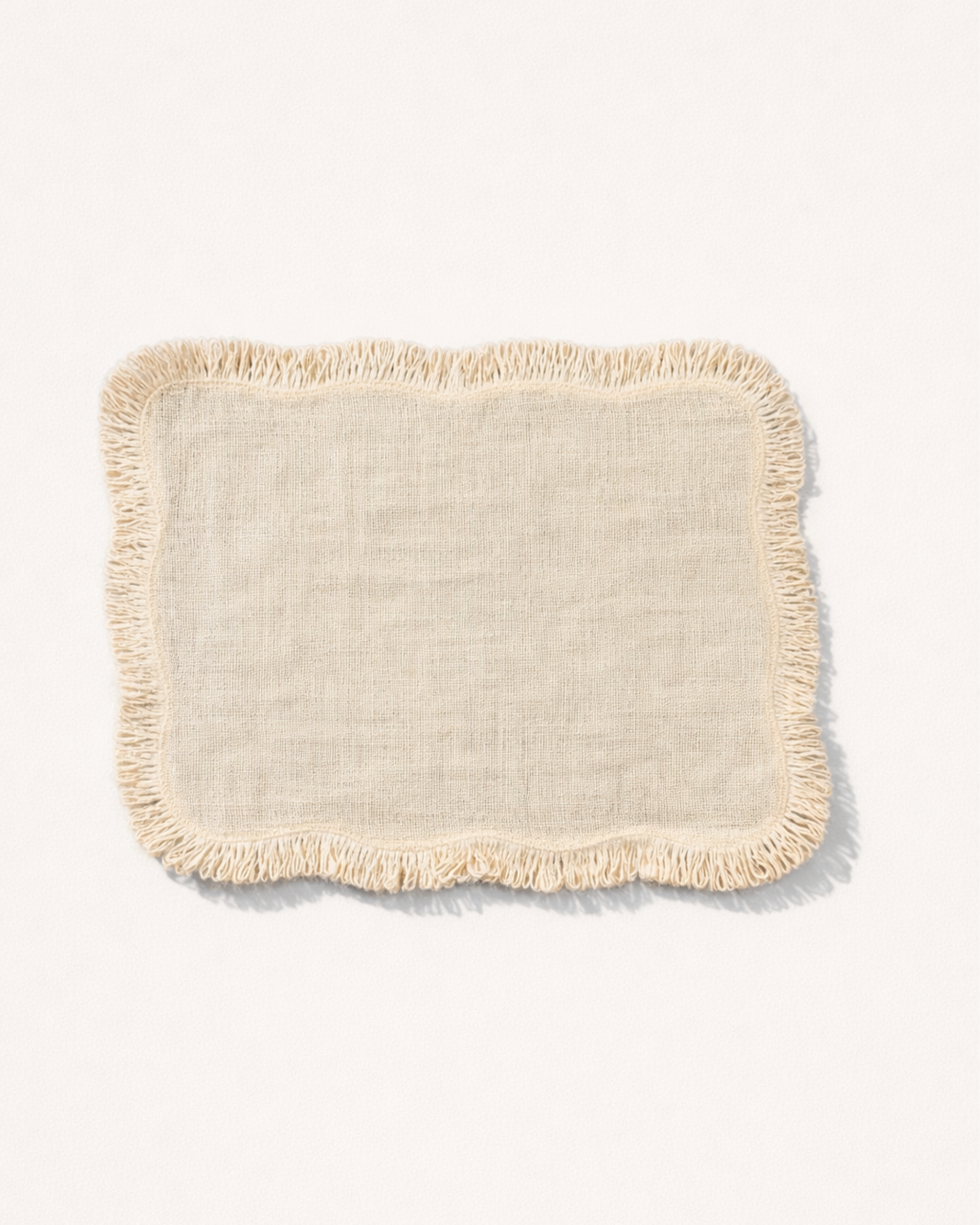 Light jute placemat with fringed edges front view