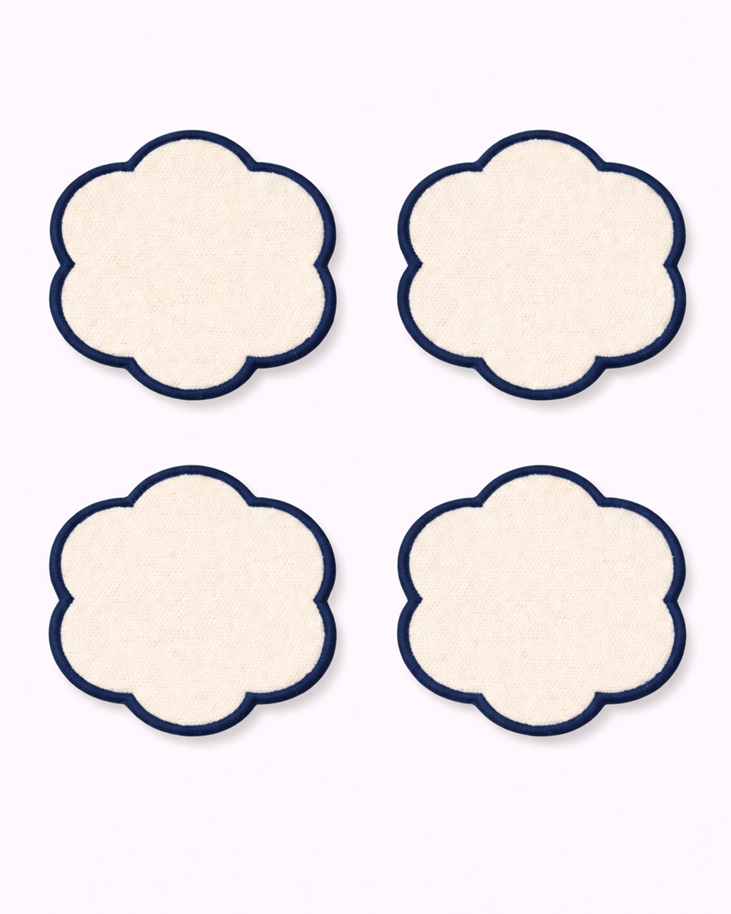 Set of four off-white cotton coasters front view