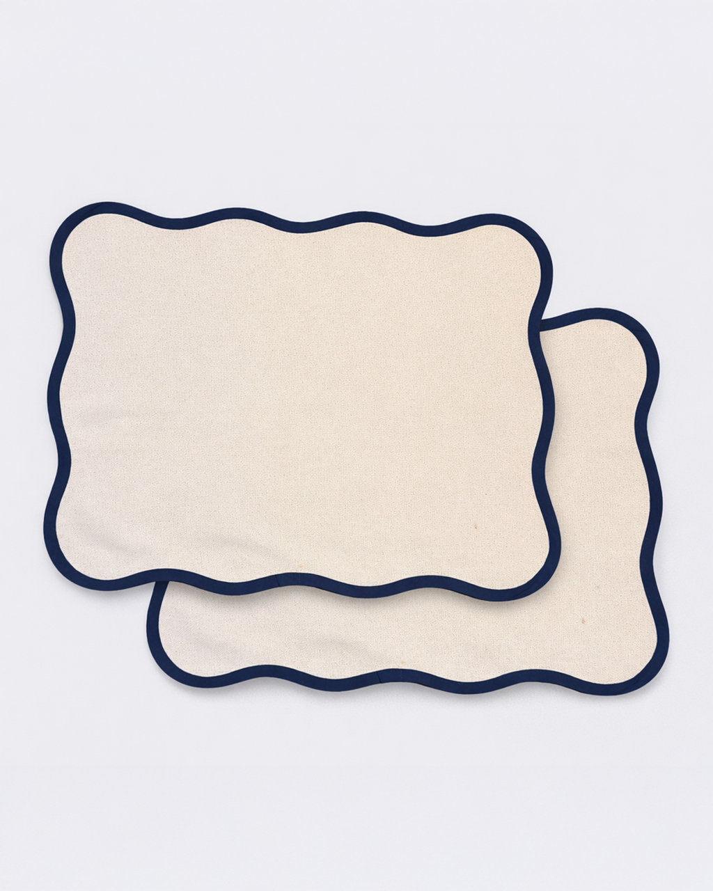 Set of two off-white cotton placemats front view