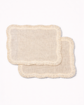 Set of two light jute placemats with fringed edges front view