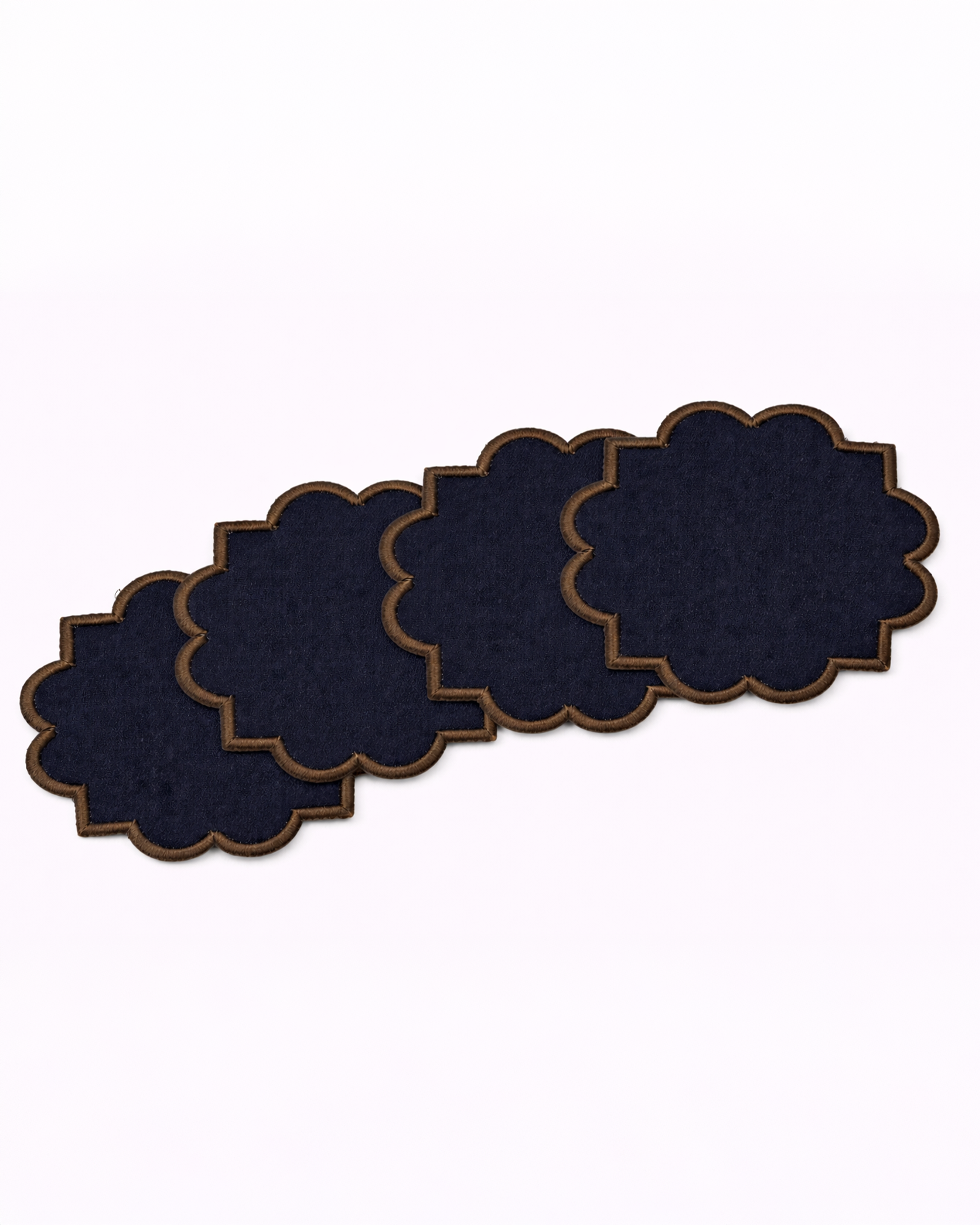 Set of four navy blue cotton coasters front view